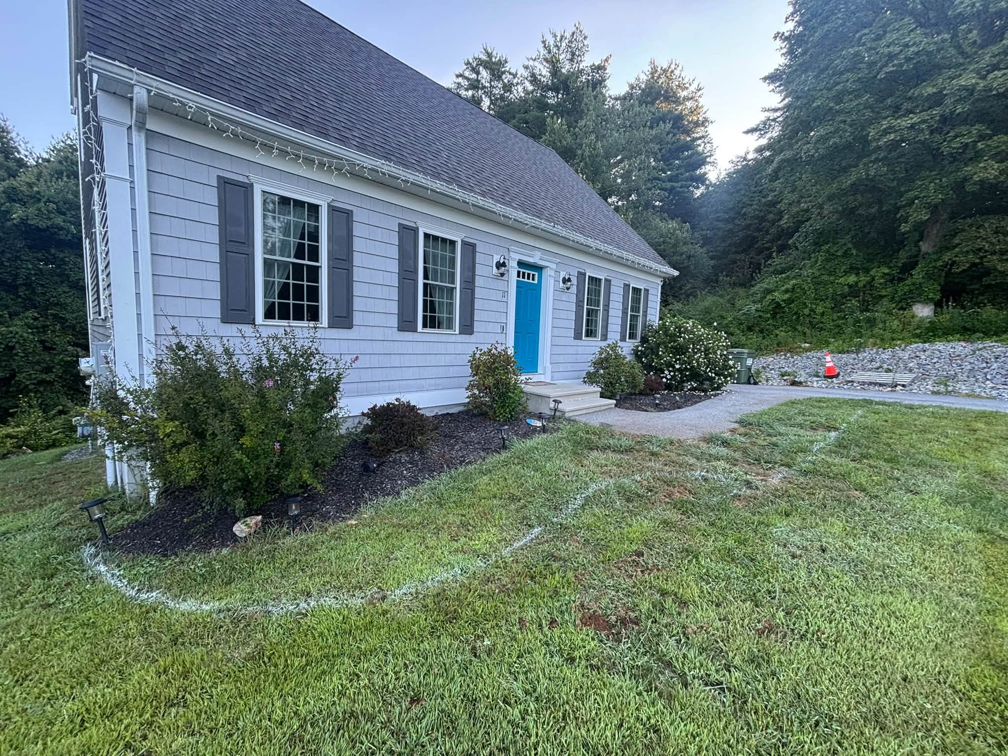 Before — yard edge prior to hardscape installation, Spencer, MA